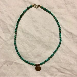 Anthropologie Turquoise and gold charm necklace